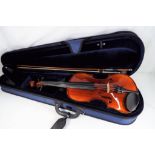 An unused Inter Music violin with bow, protective case and accessories,