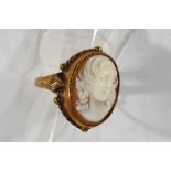 A lady's hallmarked 9 carat yellow gold cameo ring, size O, approx weight 4.