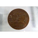 A bronze medal by Roty from the French exposition at Moscow 1891 stamped bronze to the edge,