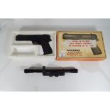 A boxed Milbro repeater 20 shot BB pistol .