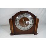 An oak cased Westminster chiming mantel clock by Enfield,