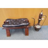 A camel seat stool with inlaid decoration and a large Indian brass tea jug approx 61cm (h)