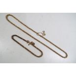 A lady's 9ct gold twisted rope chain set necklace and matching bracelet, stamped 375, boxed,