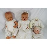 Dolls - a ceramic dressed doll with moulded jointed limbs, sleeping eyes and open mouth,