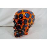 Anita Harris - A ceramic skull by Anita Harris, approx 18cm (h),
