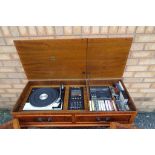 A Hi-Fi unit with built in record player, radio and tape deck by Dynatron,
