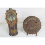 A miners lamp marked Seag Miners Supply Company Ltd type BE3 and a decorative brass perpetual