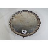 A hallmarked silver salver on pad feet, Birmingham assay 1931, approx weight 551 gm,