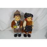 Hummel - two Hummel ceramic dolls depicting little girl and little boy with authentic clothing,