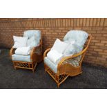 Unused Surplus Retail Stock - two wicker armchairs with upholstered cushions and throws Est £40 -