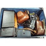 Photography - a vintage Antler suitcase containing a quantity of vintage photographic equipment to