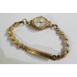A lady's Smiths five jewel wrist watch marked P10 with heart shaped bracelet Est £30 - £50.