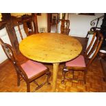 A round pine kitchen table,