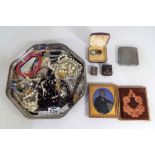 A lot to include a quantity of costume jewellery, lady's powder compact,