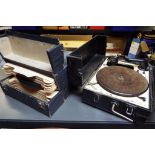 The Sonorophone (portable gramophone) and vinyl record tapes with fitted internal compartments Est