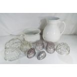 Eight predominantly glass jelly moulds with a ceramic jug and pot (10)