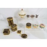 A collection of trinket boxes to include enamelled examples, filigree white metal and similar.