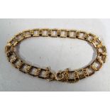 A lady's 9ct yellow gold bracelet with safety chain, approximate weight 5.14 g, Est £40 -£60.