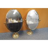 A pair of adjustable table mirrors (2).