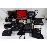 Photography - a quantity of cameras to include a Minolta 16MGS, a Sankyo 8CM, a Minox 35EL,