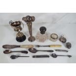 A collection of silver hallmarked items to include vase.