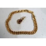 A 9ct gold bracelet and 9 ct gold stone set pendant, approximate weight 4.