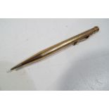 A 9 carat gold propelling pencil by Yard-O-Led, patent No. 422767 weight 22.