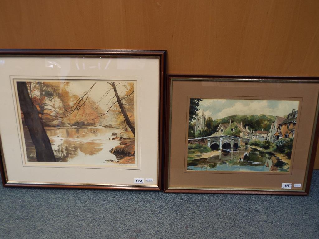 A watercolour of a village scene mounted and framed under glass signed lower right by the artist T