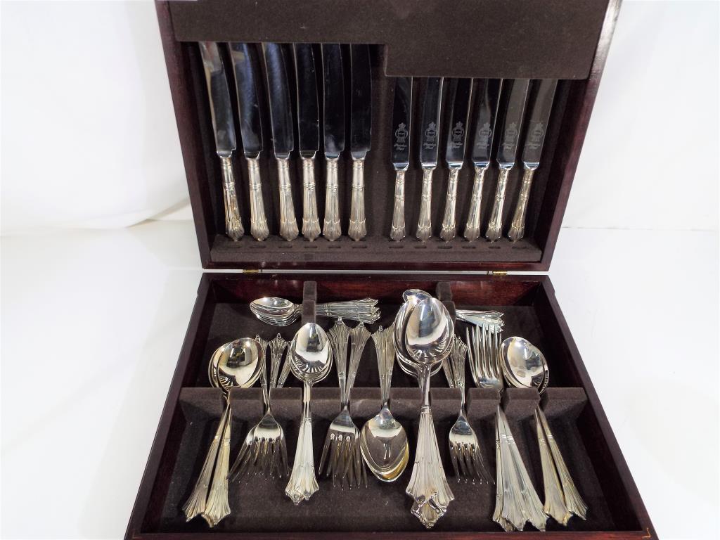 A mahogany cased canteen of plated Sheffield cutlery