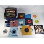 A carry case containing a quantity of 454 rpm vinyl records to include Tamla Motown, Elvis Presley,