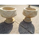 Garden - a pair of squat reconstituted stone planters on stands Est £60 - £80