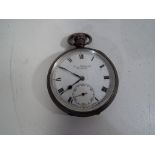 A hallmarked silver cased pocket watch, Birmingham assay 1928, Roman numerals on a white dial,