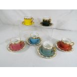 Six coffee cups and six saucers by Aynsley Est £20 - £40.
