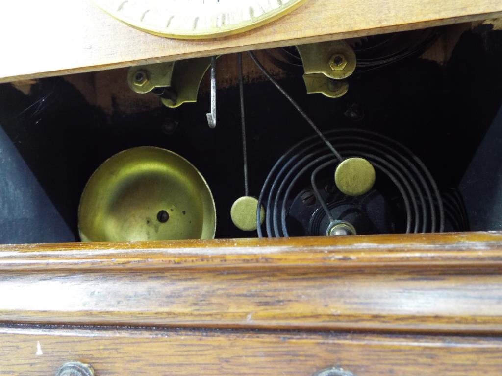 An oak cased table alarm clock by Fattorini and Sons, Bradford, - Image 3 of 3