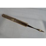 A 9ct gold hallmarked propelling toothpick approx 5.