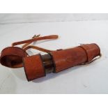 A brass and leather telescope by Kelvin and Hughes Est £25 - £45