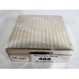 A George V silver hallmarked, cedar lined cigarette box of square form,