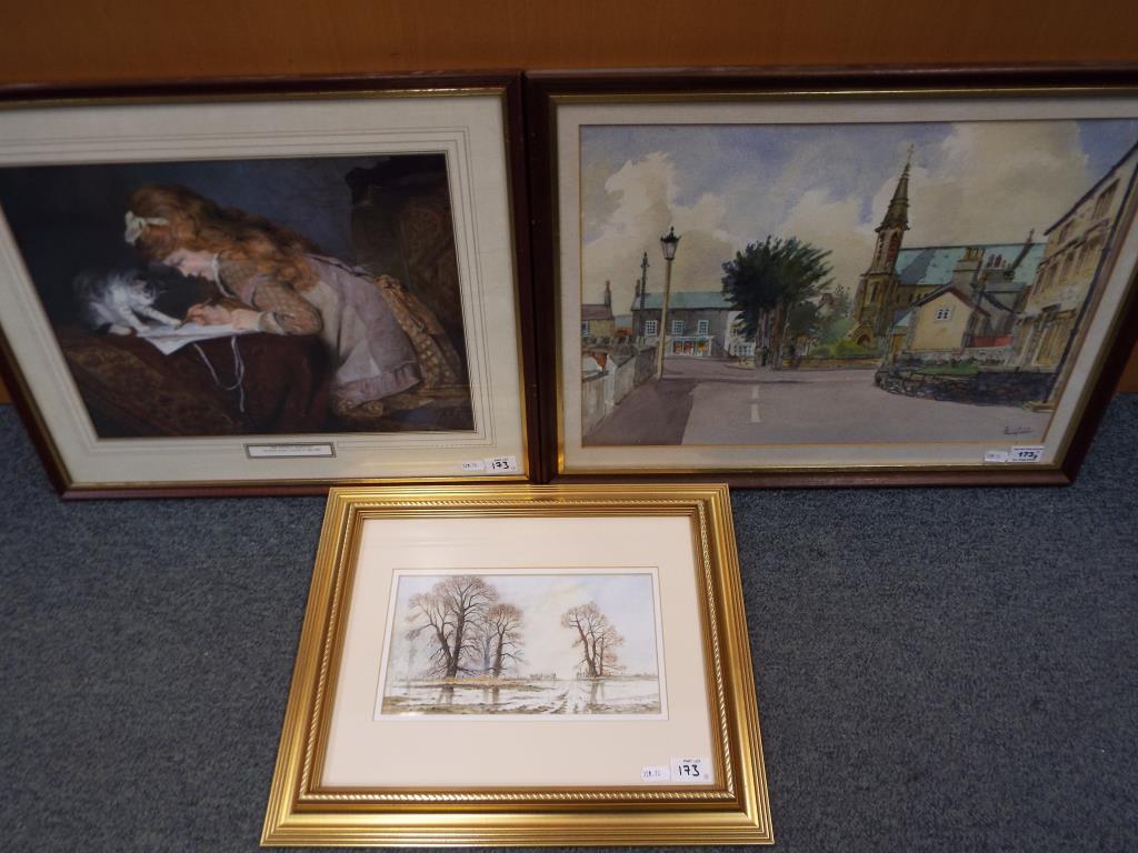 A watercolour mounted and framed under glass depicting a village scene signed lower right by the