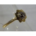An 18ct gold and diamond ring, size O, approx weight 2.