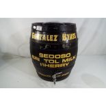 A Gonzalez Byass sherry barrel with tap approx 36cm (h) x 31cm (d) Est £20 - £40