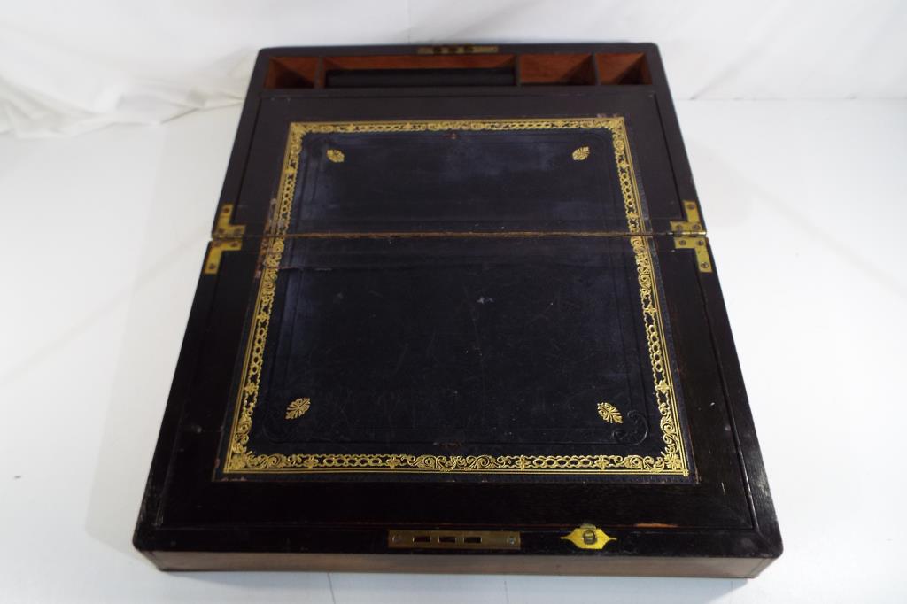 A writing slope hinged lid with black leather writing surface with gilded details with brass mounts, - Image 2 of 3