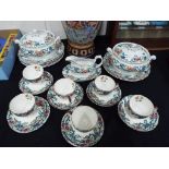 A quantity of ceramic tableware by Booths decorated in the Floradora pattern to include two lidded