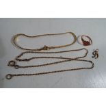 A collection of 9ct gold jewellery to include a belcher chain necklace, a bracelet,