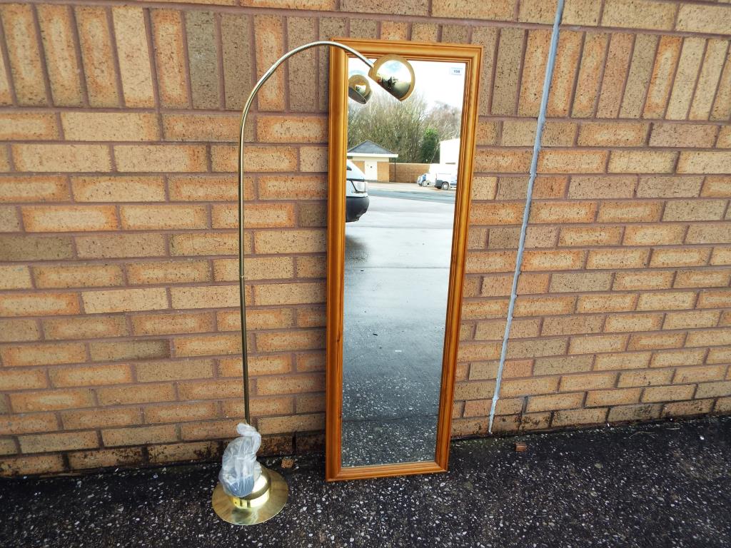 A pined framed wall mirror approximately 123 cm (H) x 38 cm (W) and a contemporary metal floor