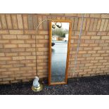 A pined framed wall mirror approximately 123 cm (H) x 38 cm (W) and a contemporary metal floor