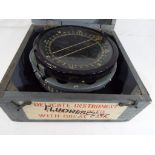 A World War Two (WW2) Bomber Command fluorescent compass.