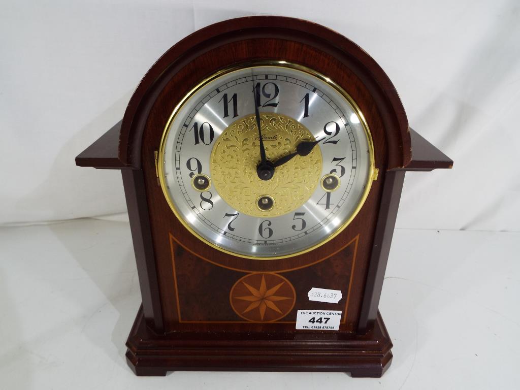 A Hermle mantle clock with the key Arabic numerals to the dial approximately 26 cm (H) Est £20 -