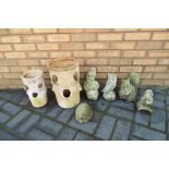 Two strawberry planters and a quantity of garden ornaments the largest being approx 40cm (h) (3)