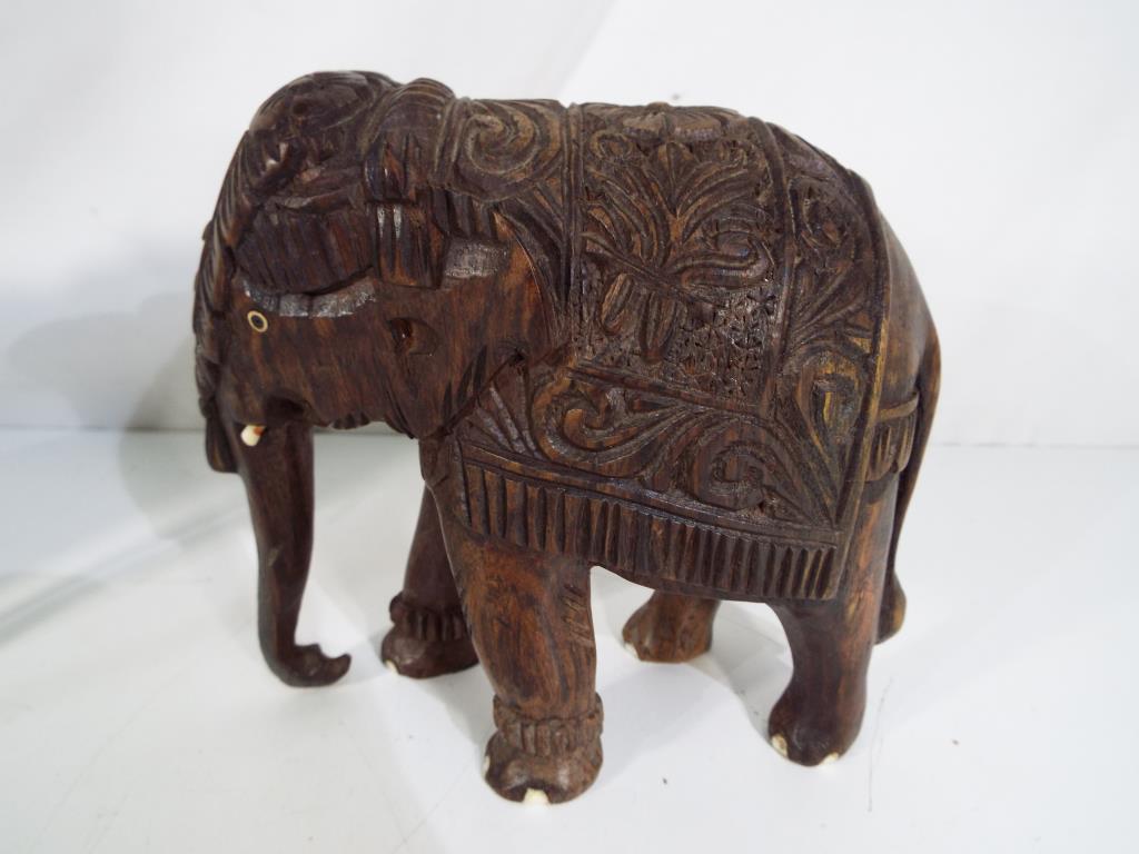 Two carved wooden models depicting elephants approx 15. - Image 2 of 2