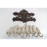Two cast iron wall key holders Est £15 - £25